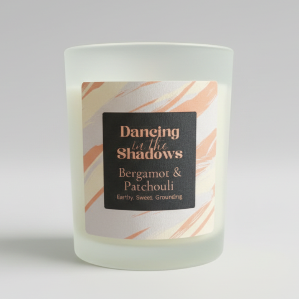 Frosted candle with a label in a studio