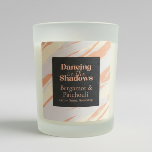 Frosted candle with a label in a studio