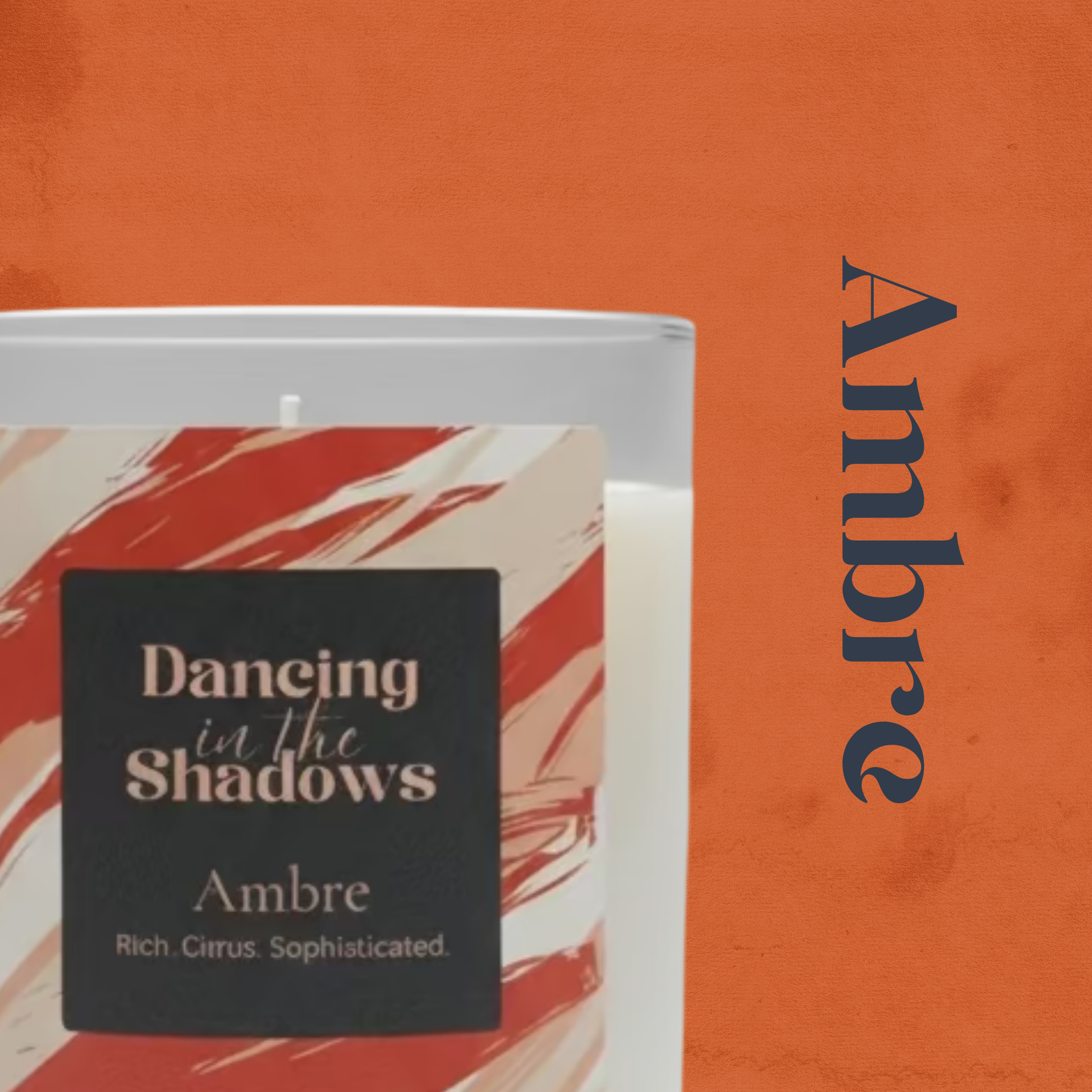 Image of an Ambre candle with its product colour in the background and name next to it.